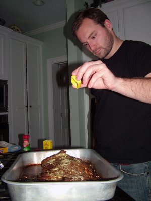 Dan adds spices to his ribs