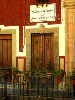 red walls, wooden doors