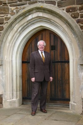 Bill Donnelly, a Trustam descendent outside St. Mary's Harlington, Bedfordshire
