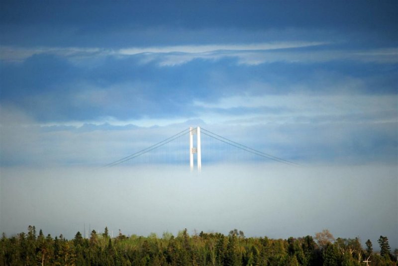 Mackinac Bridge Rises from Fog