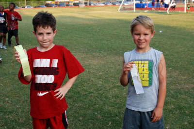 Carter and Brooks show me their ribbons