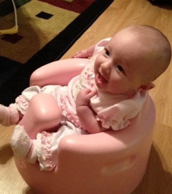 Bella in her bumbo seat for the 1st time
