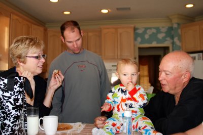 Aunt Lora, Jarrod, Brady and Coach sharing snacks