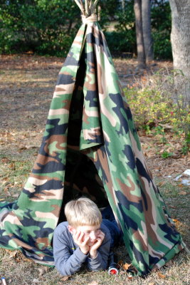 Watching the activities from the rustic tent