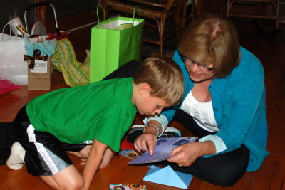 Nana helping Brooks read his birthday card