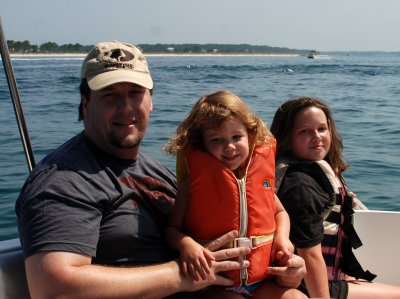 Josh, Avery, and Paige enjoying the boat ride.