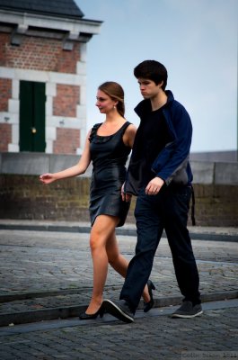 Young Couple stride out.