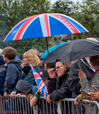 The patriotic crowd in the rain again.