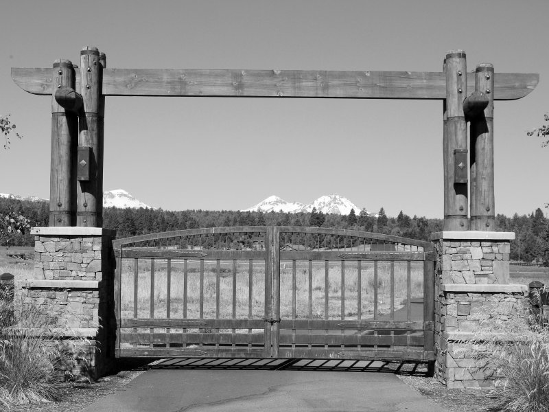 7. Ranch entry with 3 Sisters Mountains in the background
