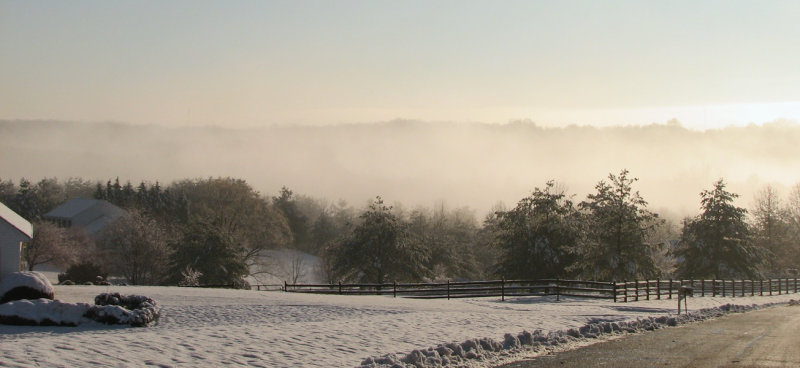 Mist over the snow in the valley