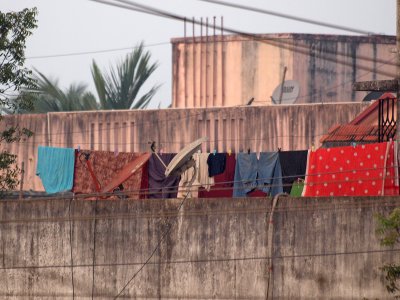 Rooftops satellite dishes and laundry