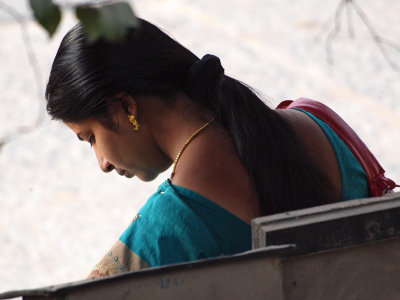 Young lady waiting for the college bus