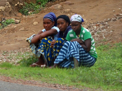 Seated beside the road