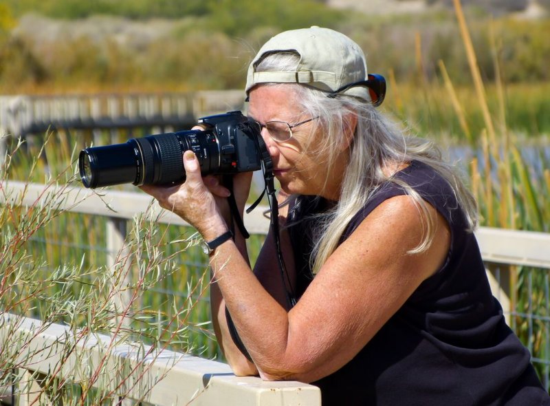 Patti hunting dragonflies at Bosque del Apache, NM