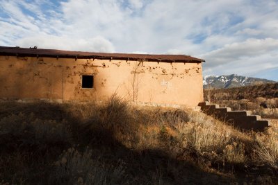 Abandoned adobe building in Valdez, NM