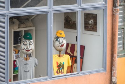 Shop overlooking the Onyar River