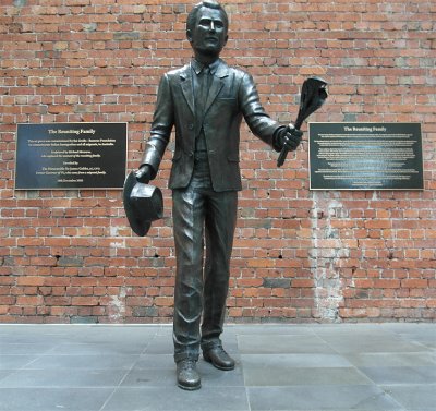 Michael Meszaros' sculpture, The Reuniting Family, at the foot of the Rialto Towers on Collins St. Melbourne, Australia.