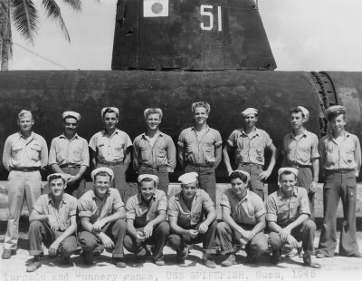 Charlie Cooper survived the sinking of the USS Wasp. He finished WWII as an officer on the USS Spikefish (on left standing)