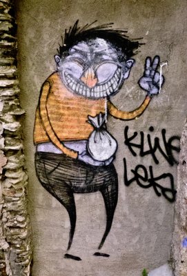 SUR UN MUR DU VILLAGE.