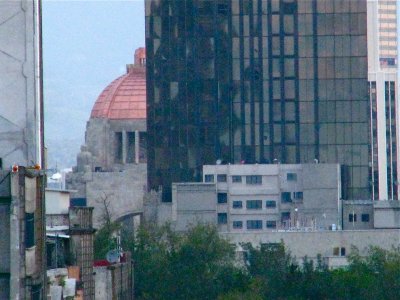 México City's Cathedral roof view of Revolution Monument dome (copper covered)