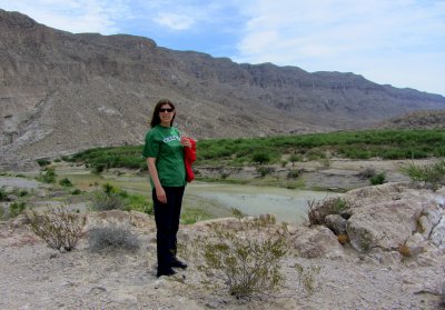 Debbie at Rio Grand with Sierra Del Carmen in background