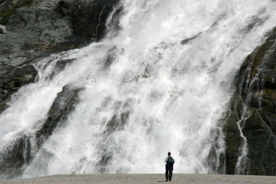Hiker and Waterfall