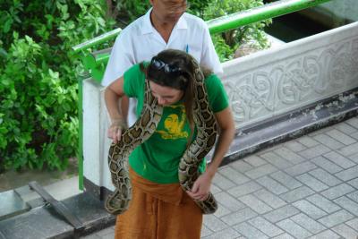Snake Farm - snake liked this girl so much, he wrapped his tail around her leg and didn't want to let go