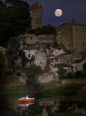Moon over medieval city