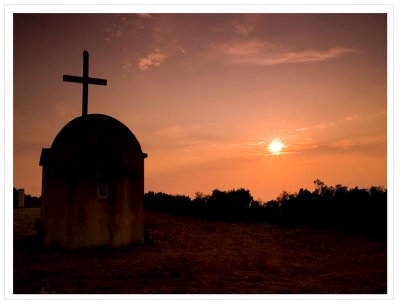 Sunset over the chapel above San Stefanos