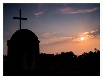 Sunset over the chapel above San Stefanos