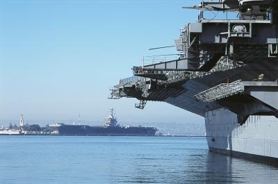 Midway flightdeck with USS Reagan in harbor