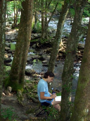 Sam relaxes by the Little Pigeon River