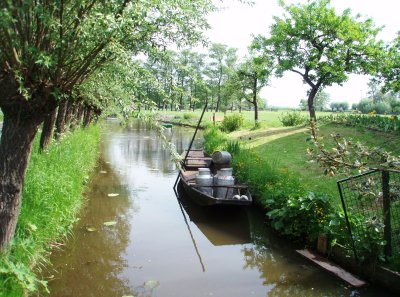 Milk cans in a boat