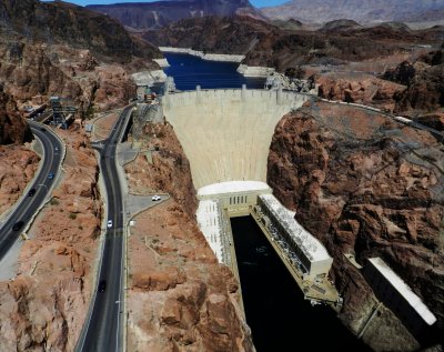 Massive Hoover Dam joining NV & AZ, creating Lake Mead