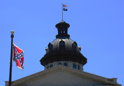 Still Flying in front of the State House - to honor our heritage