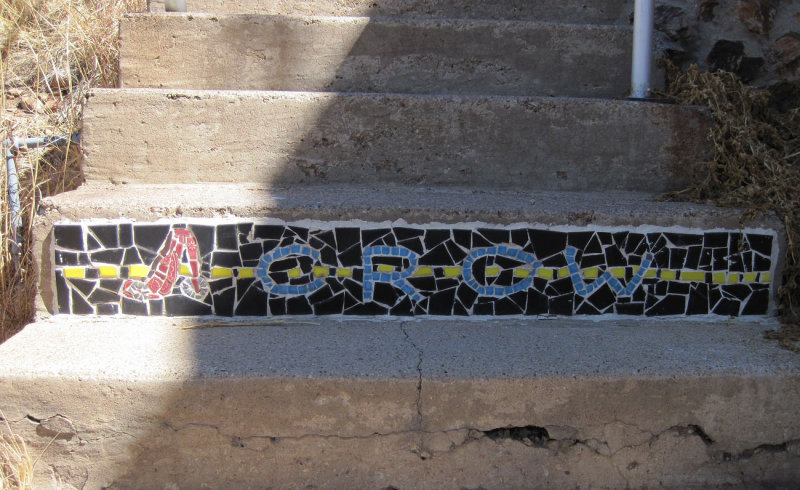 mosaic in stairs up to High Road from Iron Man intersection
