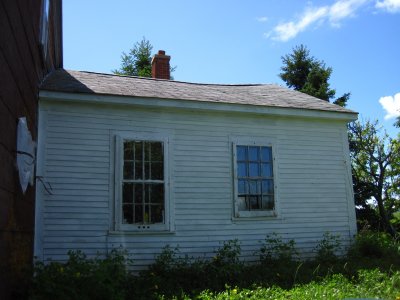 old back kitchen with swayback roof