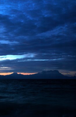 Mt. Kinabula at dawn over the sea channel