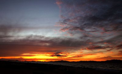 Dawn at the sandy tip of island