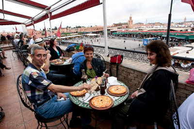 Cafe in recent bombing to left of distant tower (ctr)