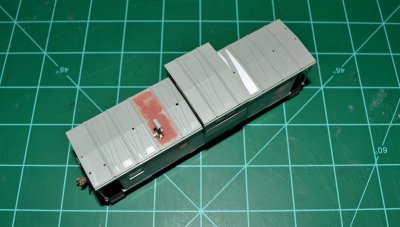 I won't bore you with the cutting off of the roof ribs but here it is completed and sanded smooth, new smokejack in place