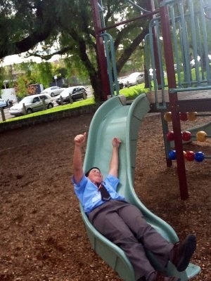 Matthew Gazis having fun on the slide
