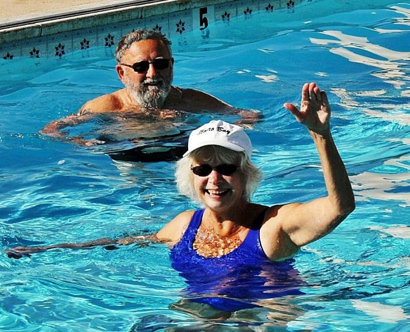 SARA AND FRIEND PETE IN WATER AEROBICS CLASS