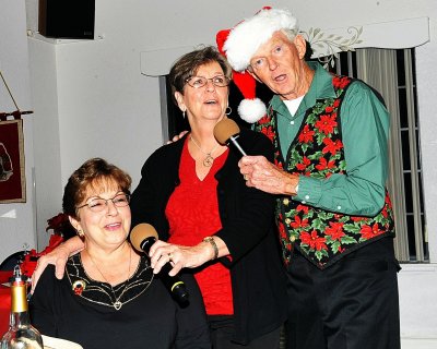 AND THE CHRISTMAS PARTY WAS FILLED WITH CHRISTMAS CAROLS