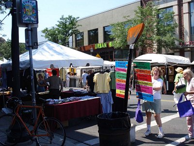 THE UP TOWN AREA OF DOWNTOWN MINNEAPOLIS HAS A FULL SUMMER SCHEDULE OF ART AND FOOD FAIRS