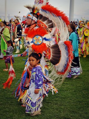 A POW WOW IS AN OCCASION WHERE NATIVE TRADITIONS CAN BE PASSED FROM PARENT TO CHILD