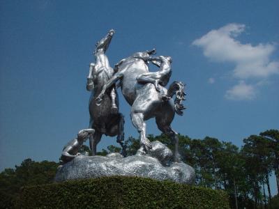 THIS SCUPTURE STANDS AT THE ENTRANCE TO BROOKGREEN SCULPURE GARDENS  AND WAS DONE BY ANNA HYATT HUNTINGTON