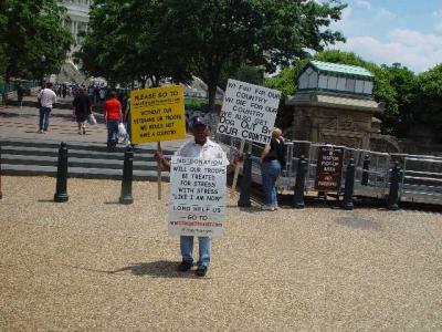 PROTESTER IN FRONT OF THE CAPITOL