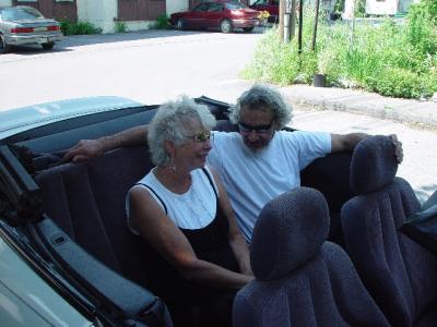 SARA AND TONY IN THE CONVERTIBLE BEFORE OUR TOUR