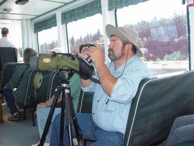 DON MANNED THE SPOTTING SCOPE BUT THE ROCKING OF THE BOAT MADE SPOTTING DIFFICULT